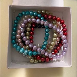 Pearl bracelets. Set of 8